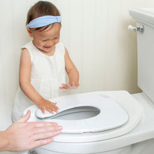 Load image into Gallery viewer, Happy Toddler Being Shown Deployed Potty Proud Seat on Toilet